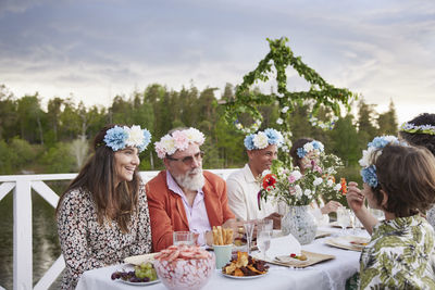 Family having midsummer dinner