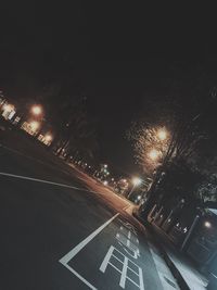 Illuminated street light at night