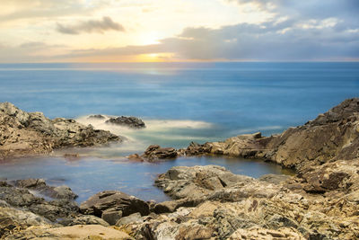 Scenic view of sea against sky during sunrisr