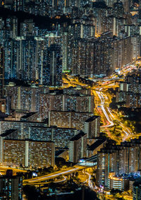 Aerial view of illuminated city at night