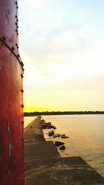 Scenic view of sea at sunset