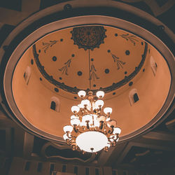 Low angle view of illuminated chandelier