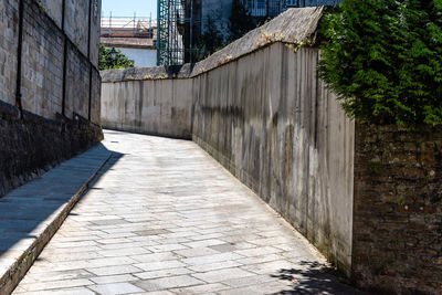 Alley amidst buildings in city