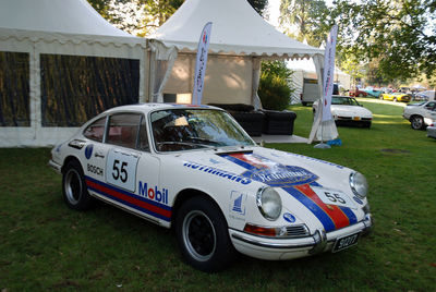 View of vintage car on grass