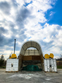 Exterior of yellow building against sky