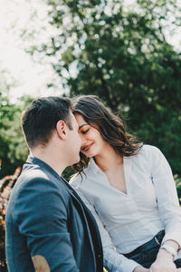 Young couple kissing outdoors