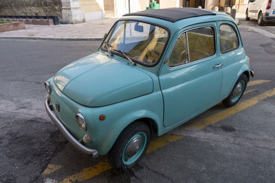 Vintage car on street in city