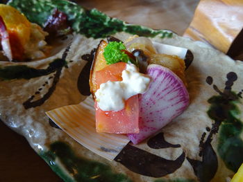 Close-up of food served on table