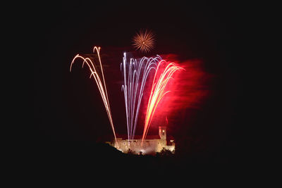 Firework display at night