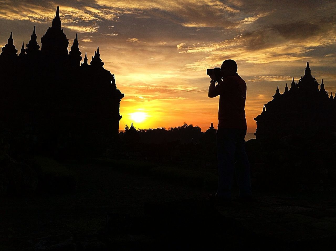 sunset, silhouette, architecture, sky, building exterior, built structure, religion, orange color, place of worship, spirituality, cloud - sky, sun, church, outline, dark, dusk, scenics, dramatic sky