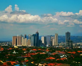 Modern cityscape against sky