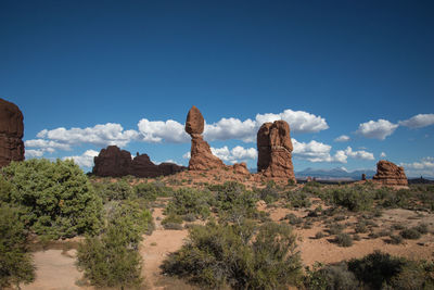 Panoramic view of rock formations against sky