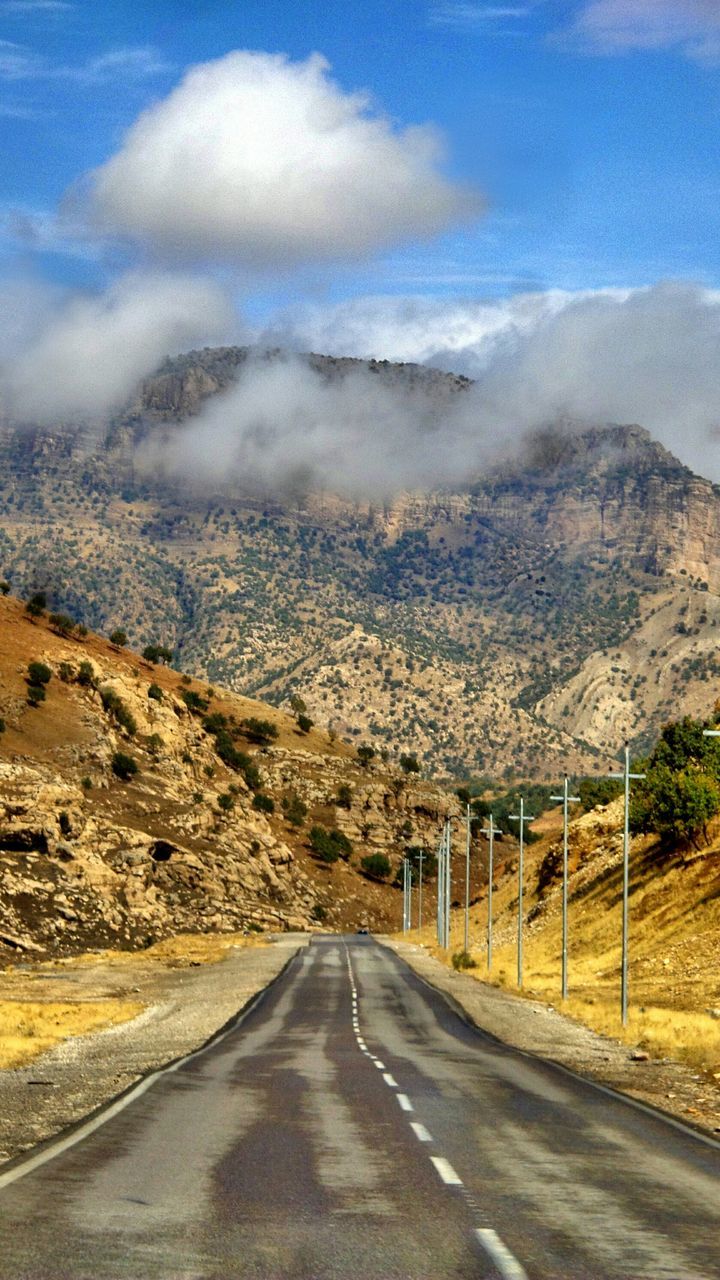 the way forward, road, sky, transportation, mountain, diminishing perspective, country road, vanishing point, landscape, cloud - sky, road marking, empty road, tranquil scene, nature, scenics, tranquility, cloud, beauty in nature, street, mountain range