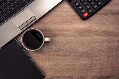 High angle view of coffee cup on table