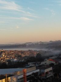 High angle view of townscape against sky at sunset