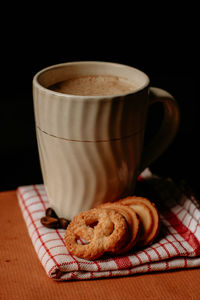 Close-up of coffee cup on table