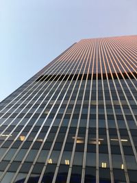 Low angle view of skyscraper against clear sky