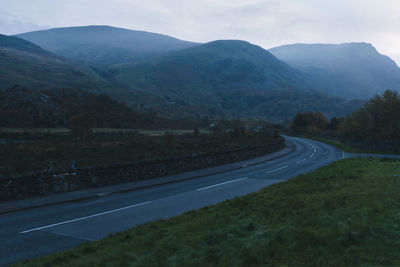 Road on mountain against sky