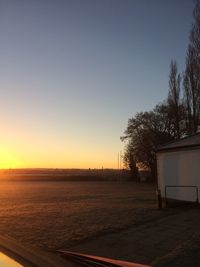 Scenic view of sunset against clear sky
