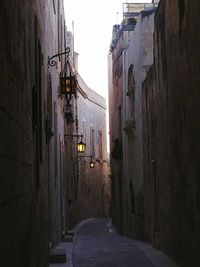 Narrow alley along buildings