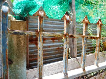 Close-up of rusty metal fence