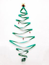 High angle view of christmas decoration on white background