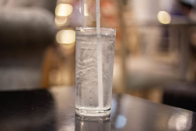 Close-up of beer glass on table