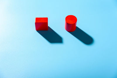 Close-up of red umbrella against white background