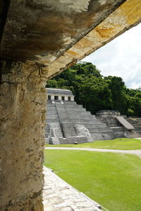 View of old ruin building against cloudy sky