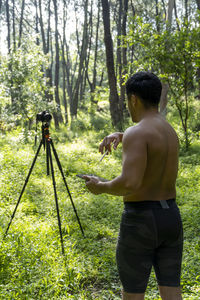 Guy with tablet making video blog on phone. isolated person giving online classes. 