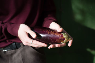 Close-up of man holding ice cream