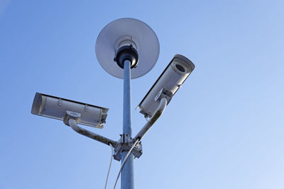 Low angle view of street light against clear sky