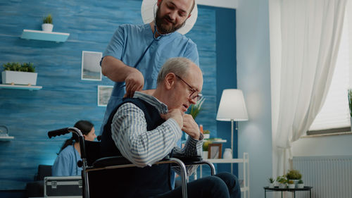 Doctor examining patient at hospital