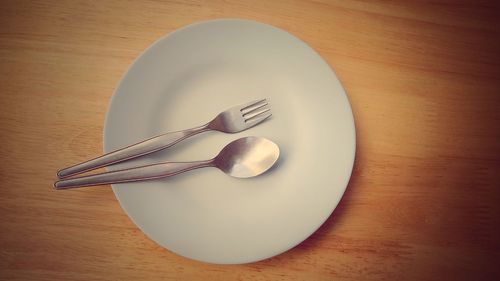 High angle view of empty plate on table