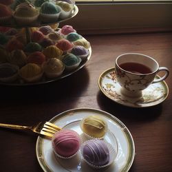 High angle view of coffee served on table