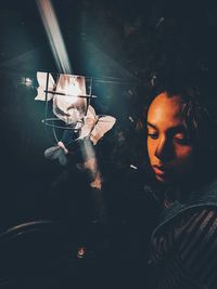High angle view of woman looking at camera