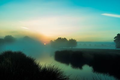 Scenic view of landscape during sunset