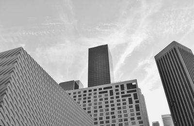 Low angle view of modern buildings against sky