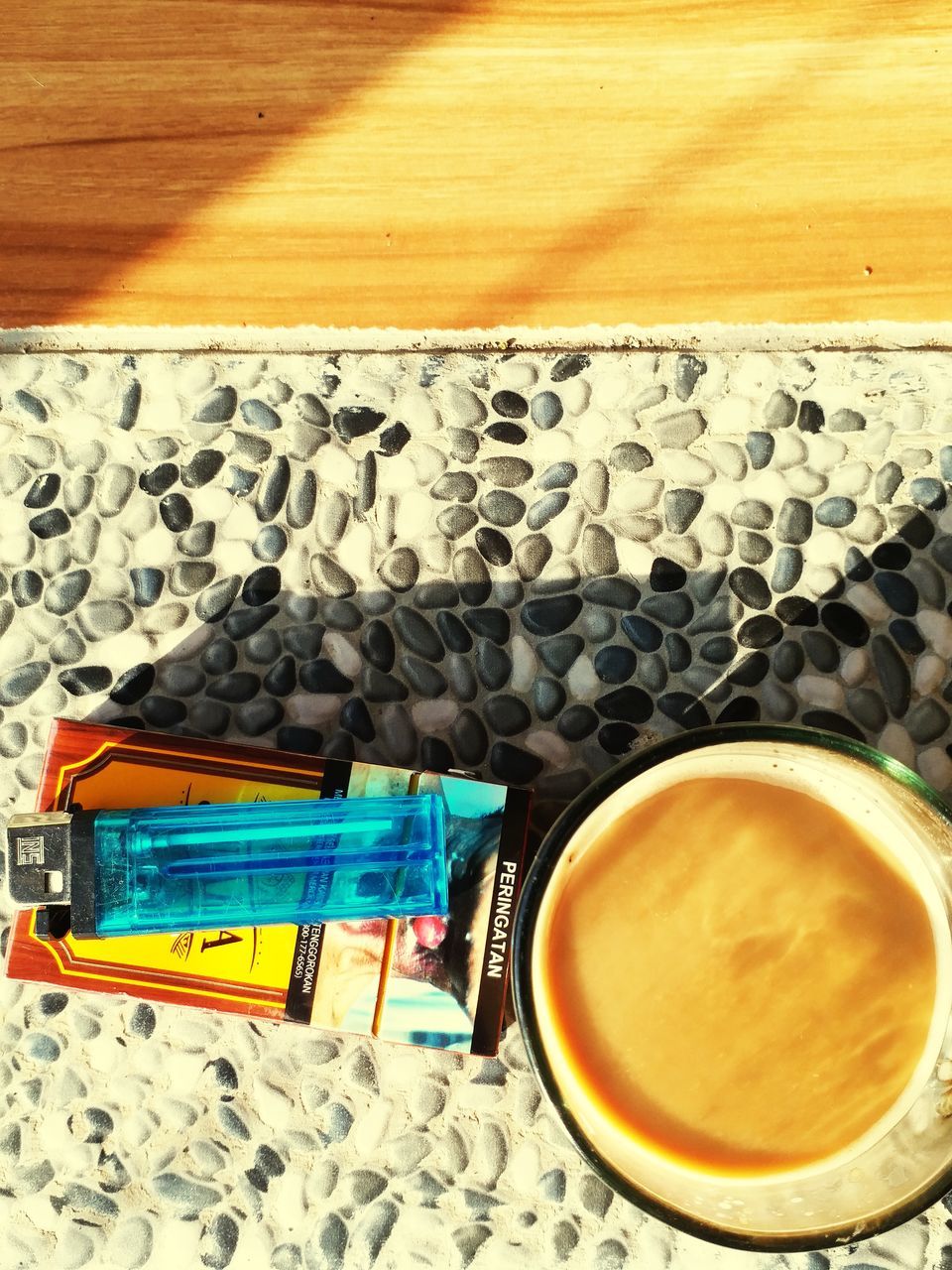 coffee, table, coffee cup, drink, mug, high angle view, still life, cup, food and drink, refreshment, no people, indoors, directly above, close-up, yellow, freshness, wood, art