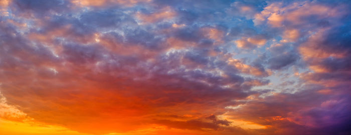 Low angle view of dramatic sky during sunset