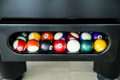 High angle view of multi colored balls on table