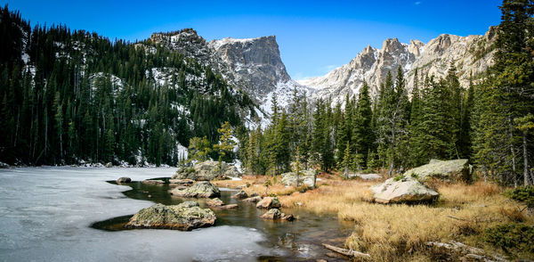 Scenic view of mountains against sky during winter