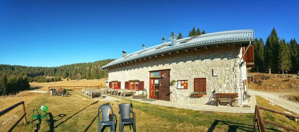 View of built structure against clear blue sky