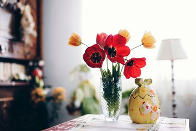 Close-up of vase on table at home