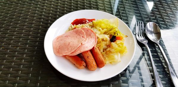 High angle view of breakfast in plate on table