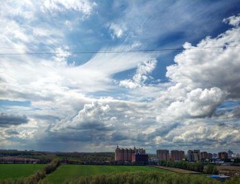 Scenic view of residential buildings against sky