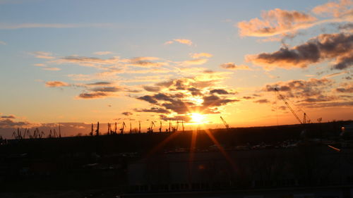 Silhouette of trees against sky during sunset