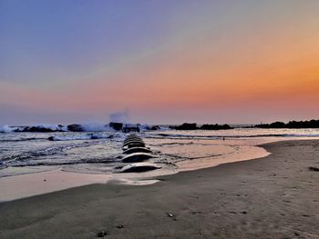 Scenic view of sea against sky during sunset