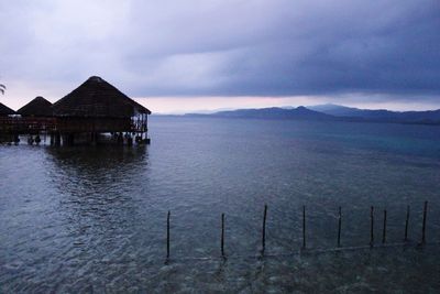 Scenic view of sea against cloudy sky