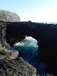 Scenic view of sea against blue sky